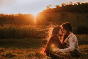 couple kissing at dawn lgbtq